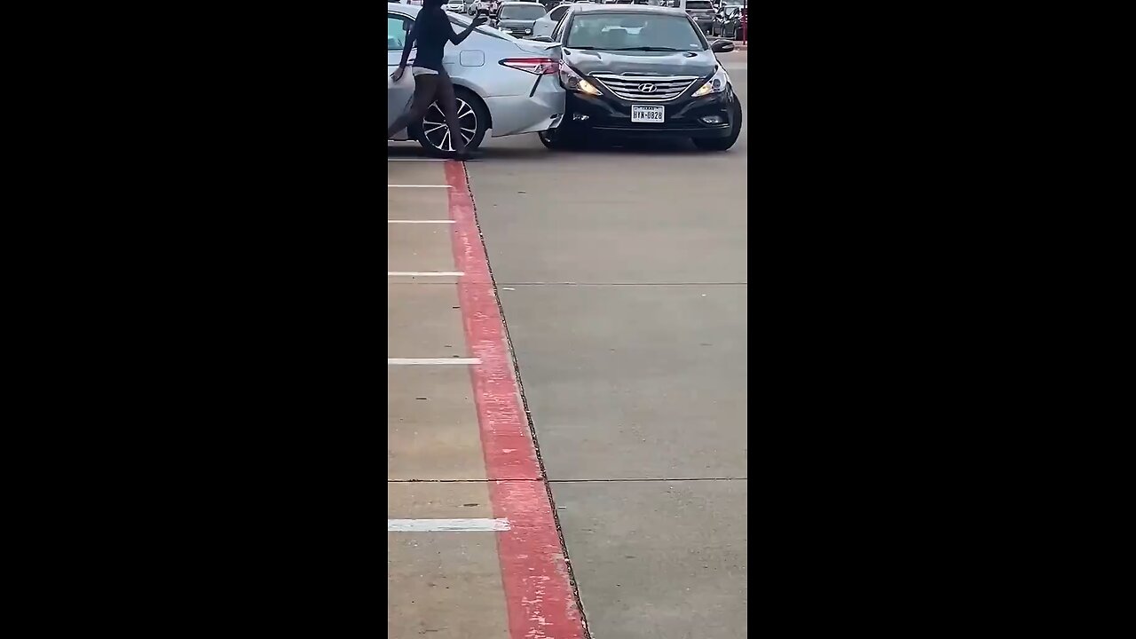 A woman accidentally hit a parked car while backing out. #Accident #Traffic #japd