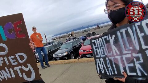 Black Conservative brings a Reparations Jar to a BLM protest full of White People. 🤣