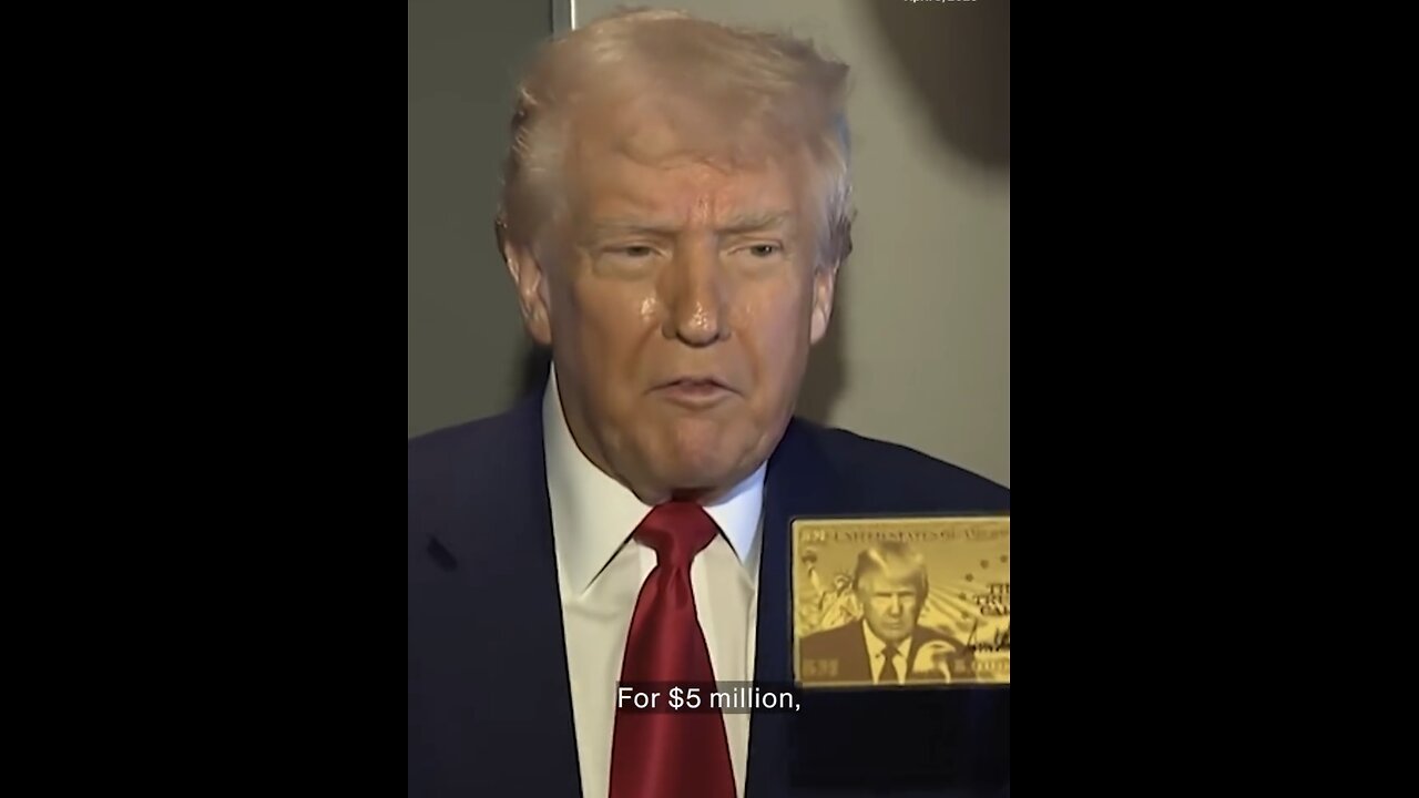 Trump showed off a gold card with his face emblazoned on it while speaking with reporters on A