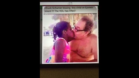 Chuck Schumer and Maxine Waters holding hands and chanting "We Will Win"