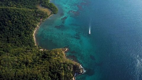 Drone Footage Of The Island With Boats In The Sea