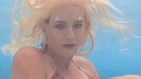 Beautiful Underwater Swimming Girl