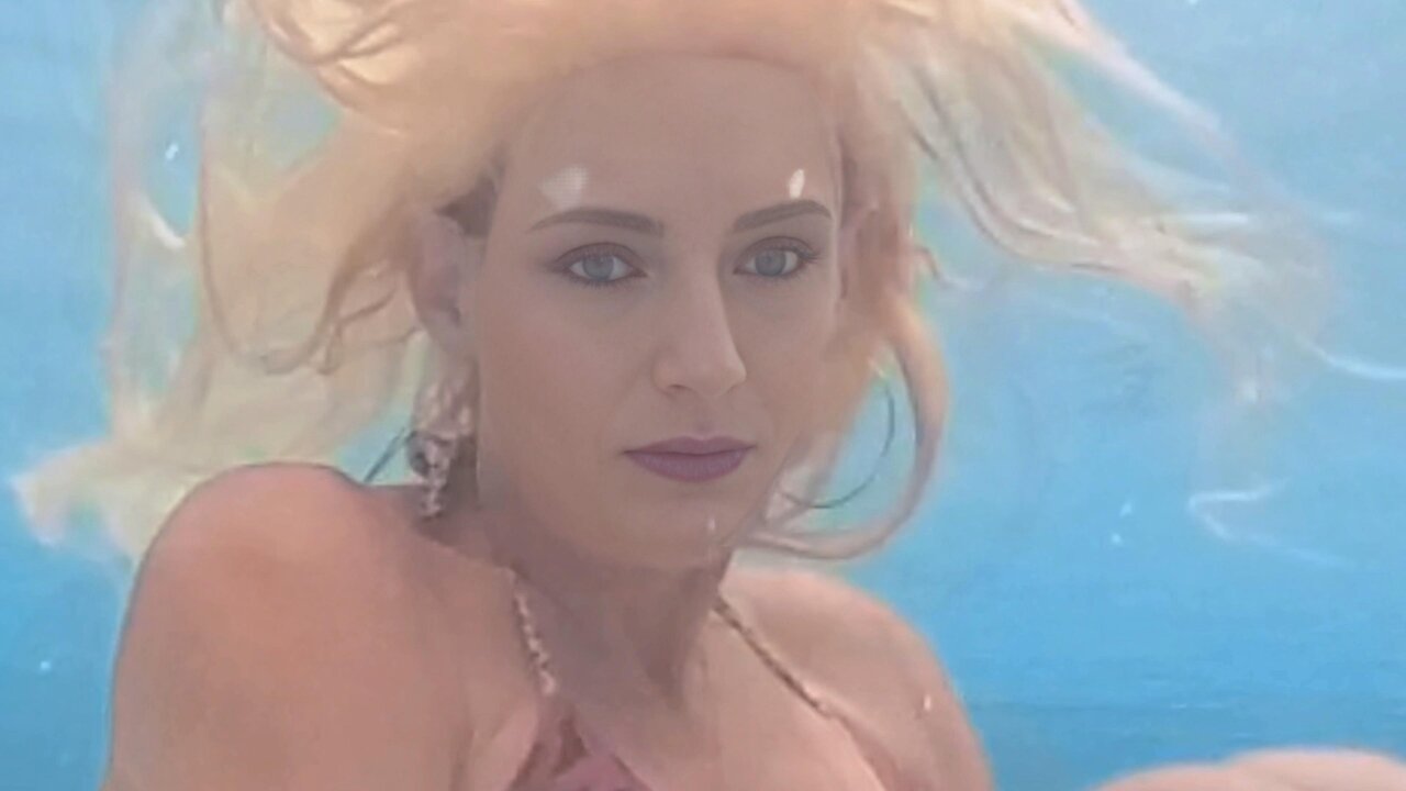 Beautiful Underwater Swimming Girl