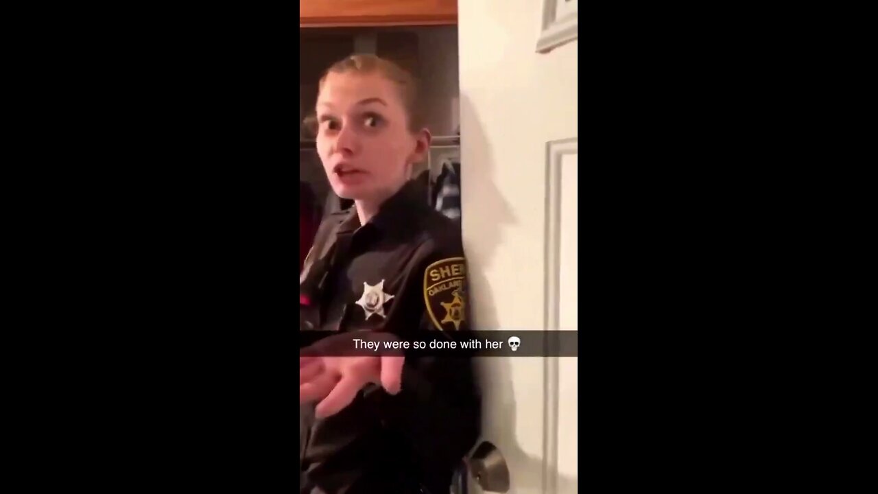 That cop looks so done with her childishness