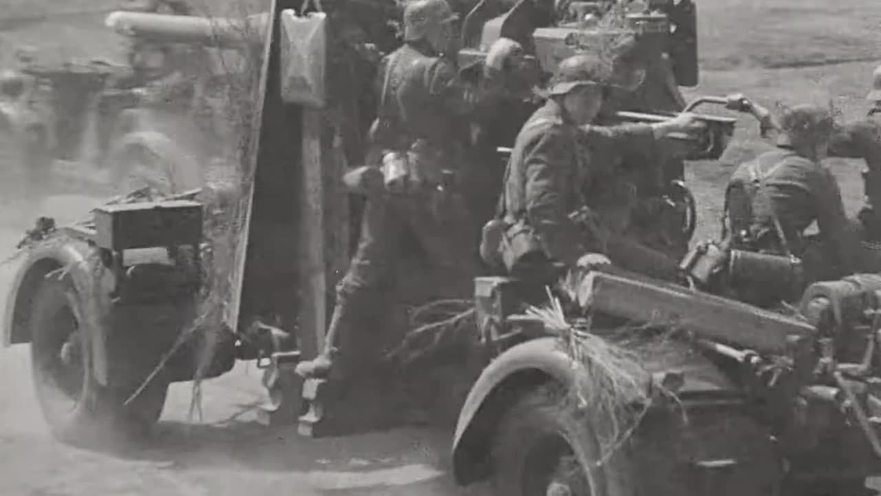 Mobile Flak gun crews training in the engagement of ground targets in 1943