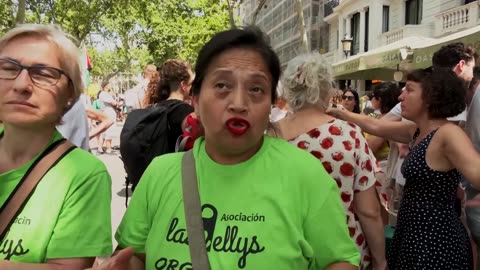 Barcelona residents protest tourism with water pistols and smoke bombs