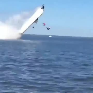 Horrific moment two men are killed when their speedboat flies off the water and flips over in 180mph smash