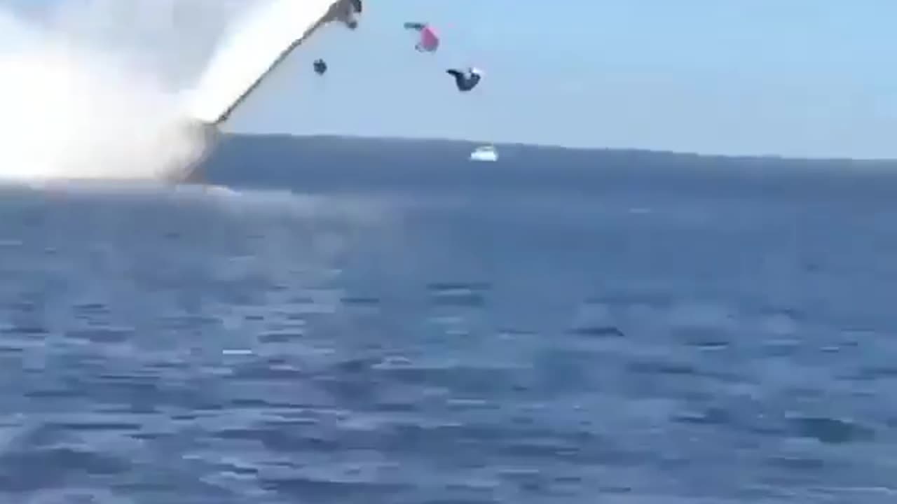 Horrific moment two men are killed when their speedboat flies off the water and flips over in 180mph smash