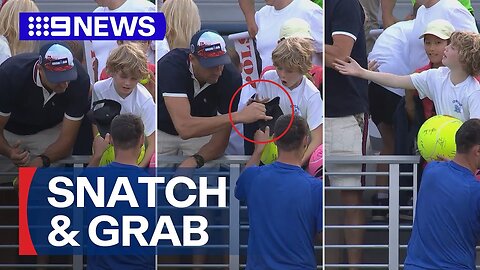 Businessman apologises after snatching signed hat from boy at U.S. Open | 9 News Australia