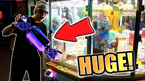 WINNING AT THE BIGGEST CANDY CLAW MACHINE EVER!