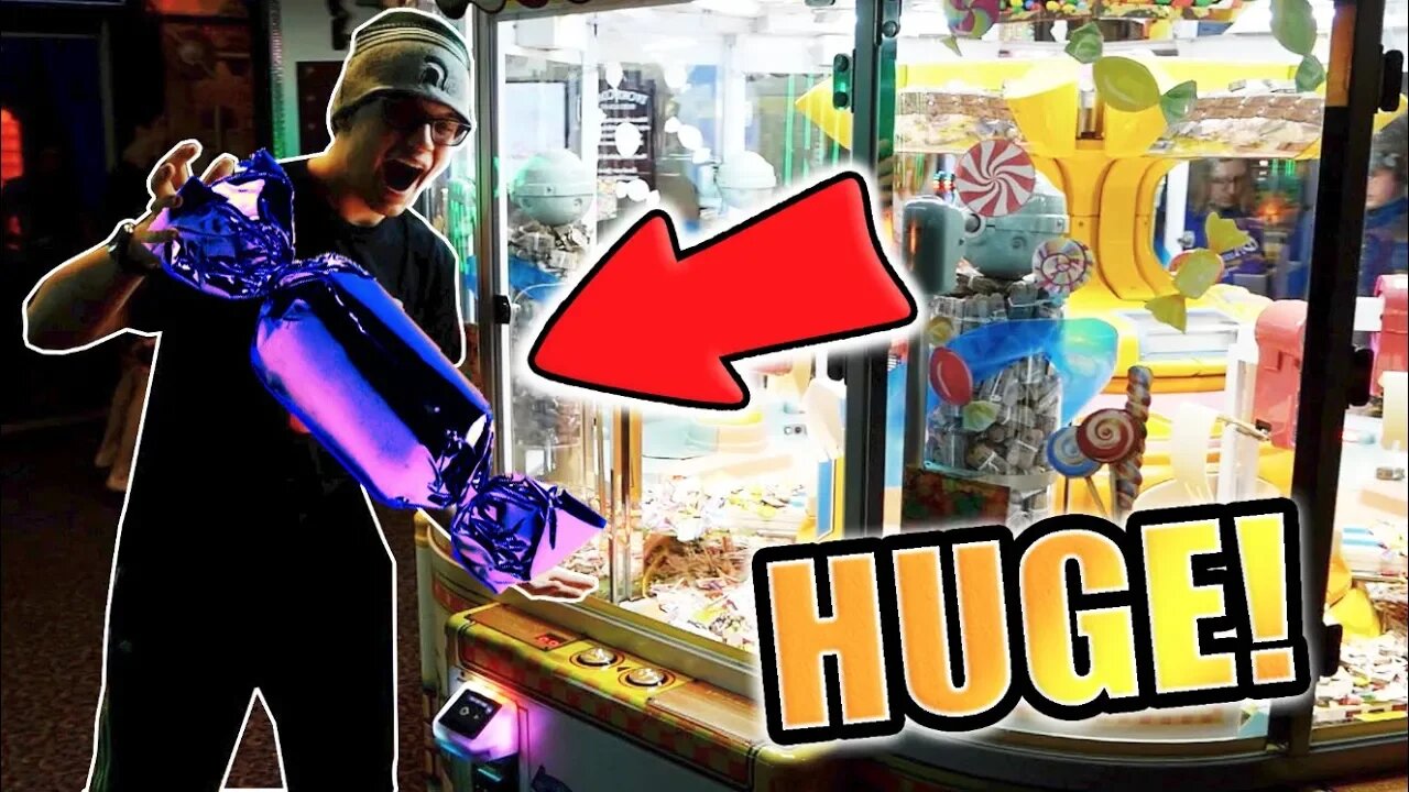 WINNING AT THE BIGGEST CANDY CLAW MACHINE EVER!