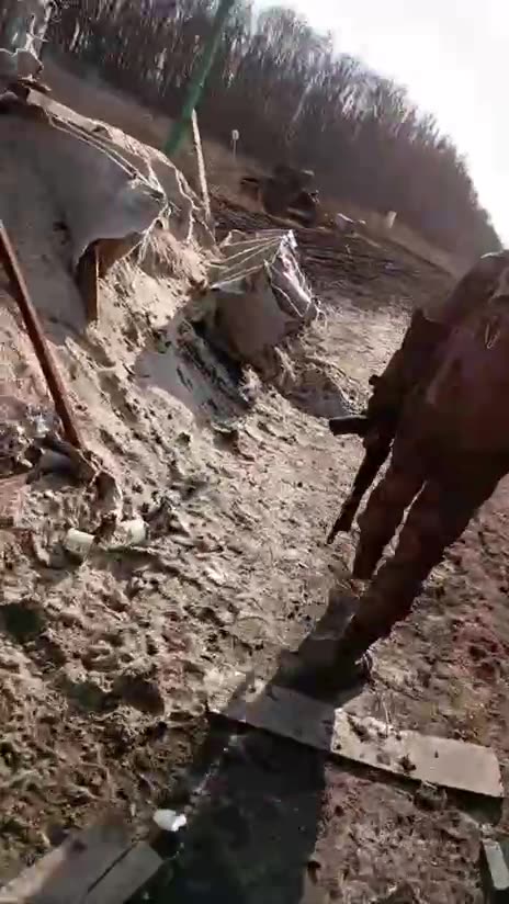 Ukrainians Moving Through a Former Border Crossing Near Kursk Oblast