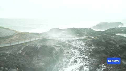 'Second surge' warnings as coastal low brings damaging winds, floods