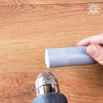 A skilled plumber connecting water pipes!.hd