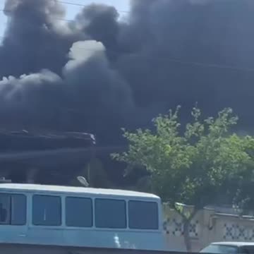 Sky over Mashhad completely ENGULFED by black smoke