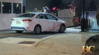 Suspect sought after car rams FBI gate in potential ‘act of terror,’ official says