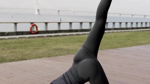 Yoga girl stretching and working out