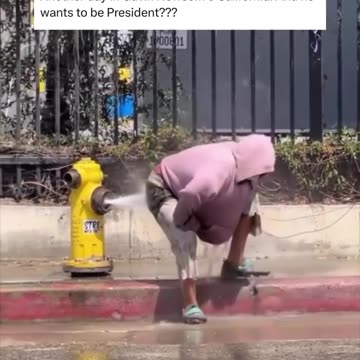 Nigger taking a bath in public