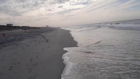 Walking along the beach in Indian Beach, NC