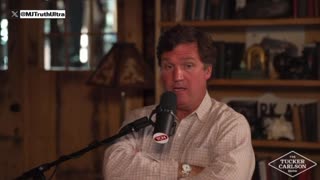 Tucker Carlson and his guest talk about “QAnon”