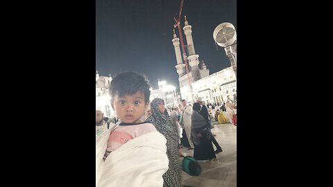 "A Child’s Peaceful Night in Makkah – Under the Clock Tower"