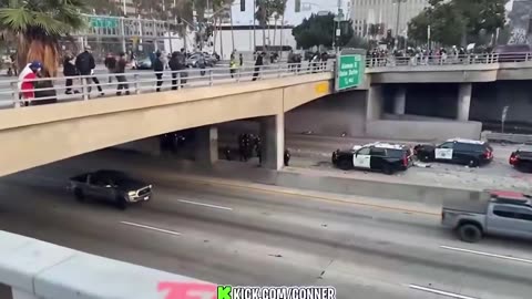 Los Angeles ICE protesters trap police officers under bridge