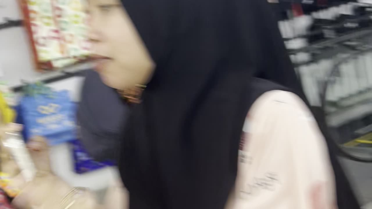 "Married Couple Shopping for Home Essentials Together"