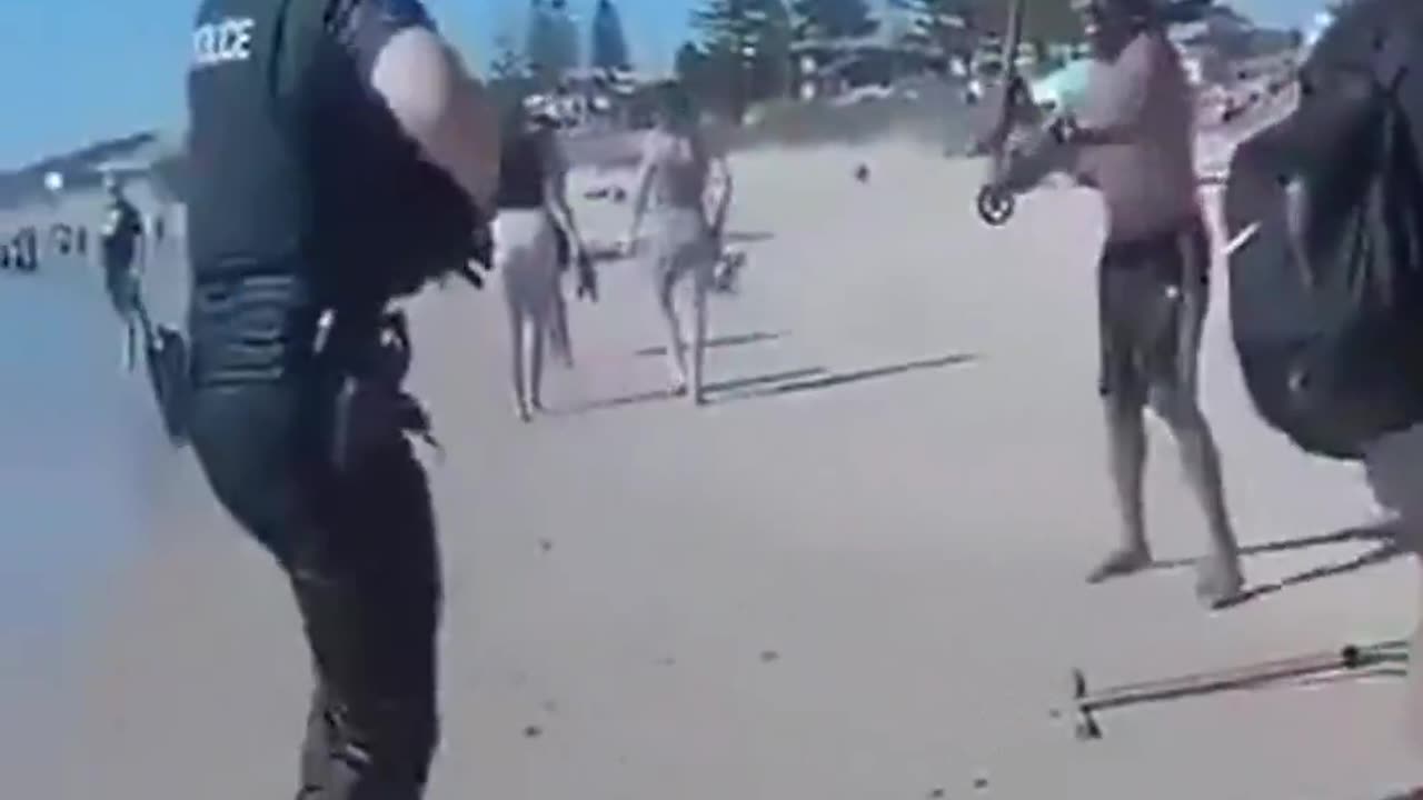 A man hit a female police officer in the face.