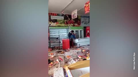 Video shows aftermath of store looted in flood-hit North Sumatra