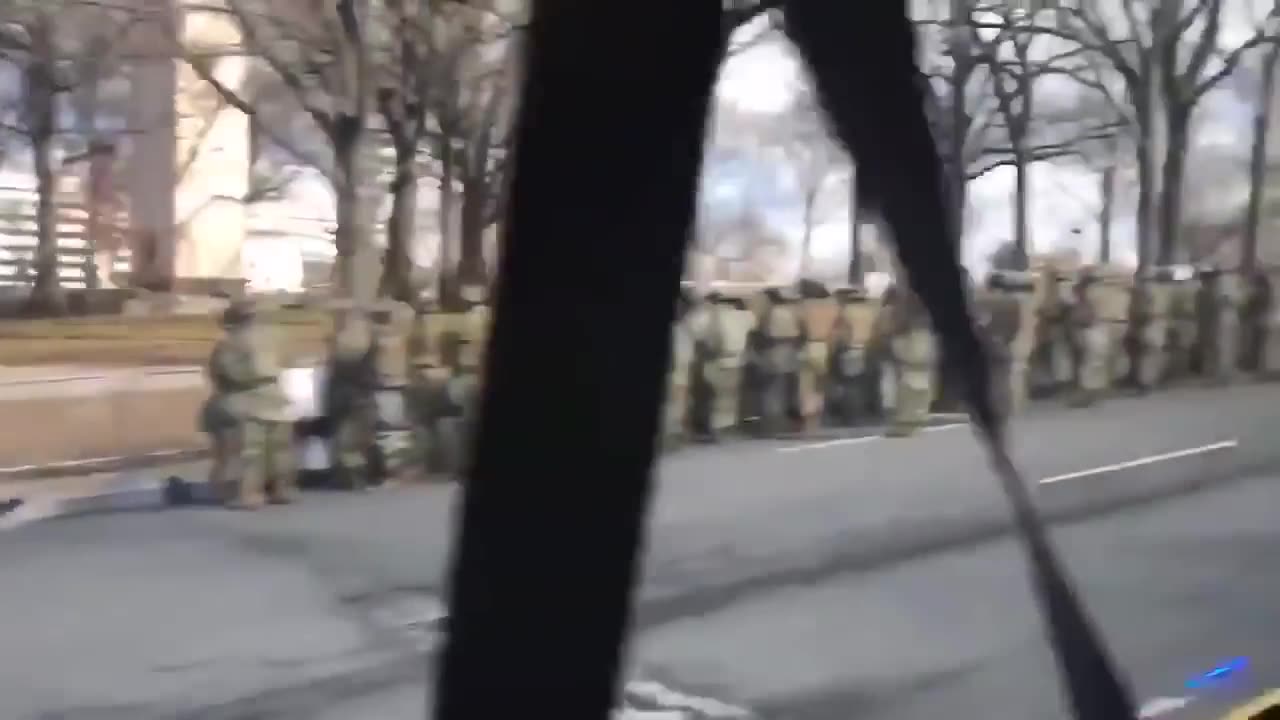 Military turns backs to Joe Bidens motorcade