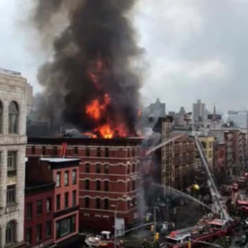 AN APARTMENT COMPLEX EXPLODES IN MANHATTAN