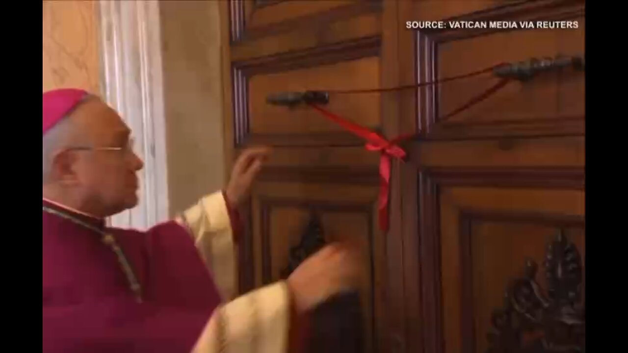 Seals in the palace doors of the Vatican after the fake clone pope passes.