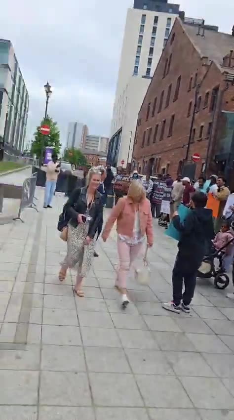 Illegal immigrants outside the council buildings in Leeds city centre, complaining