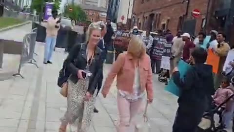 Illegal immigrants outside the council buildings in Leeds city centre, complaining