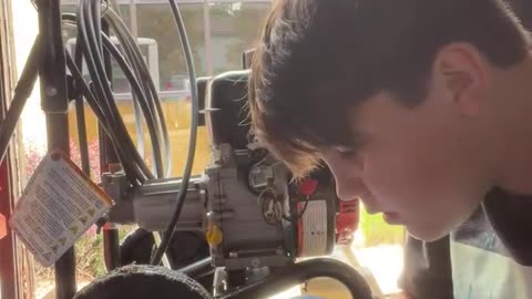 Justus tries to get the power washer started take 2.0