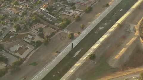LA police chase suspect drives into waterway tunnel