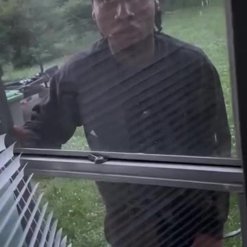Man breaks into home while woman films it, home invasion, breaks window