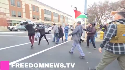 Jake Lang, leader of "Americans against Islamification" threatens to burn a Quran while slapping