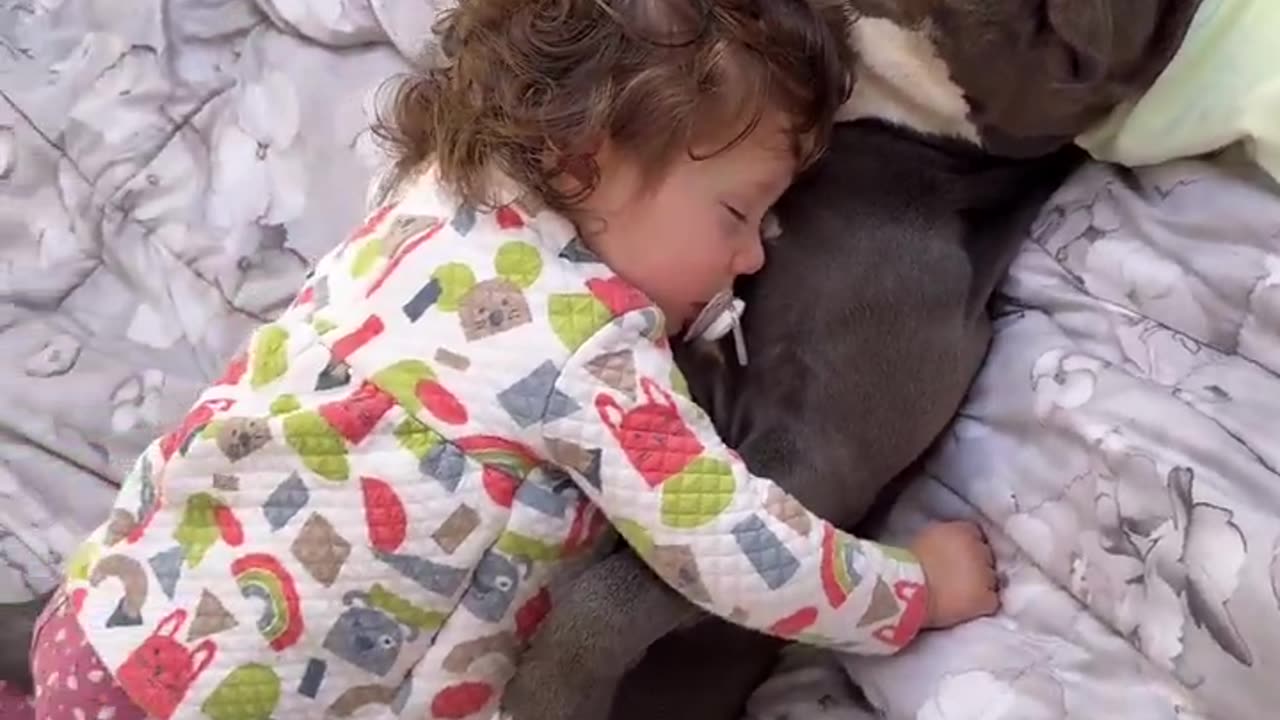 He doesn't move to not disturb her.