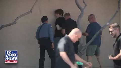 Man arrested vandalizing Charlie Kirk memorial outside Turning Point USA's headquarters in Arizona.