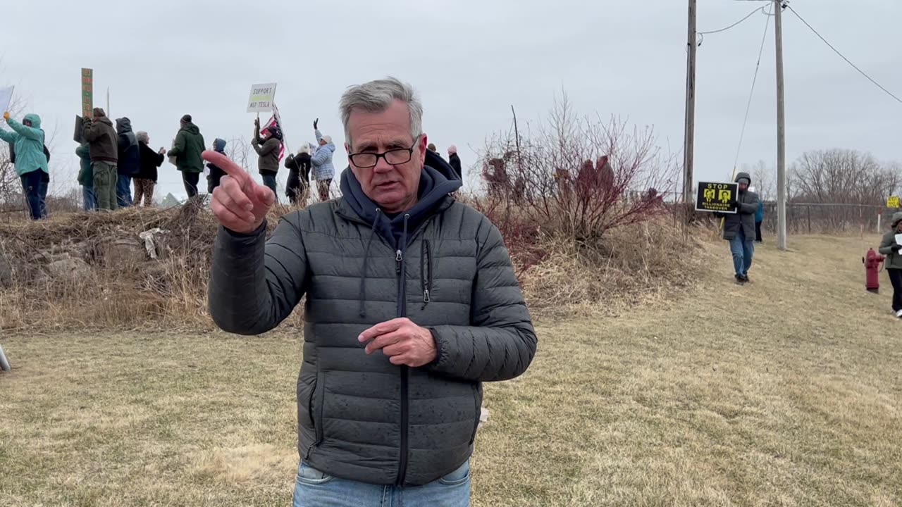 Telsa Protest in Rogers, not as many protesters!