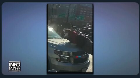 WATCH: Crazed Leftist, Emboldened to Martyrdom, Attempts to Stop a Moving ICE Vehicle With Her Body