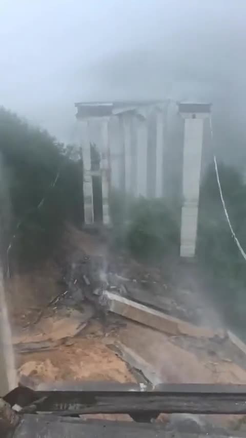 Bridge is out, trucker hangs in the balance