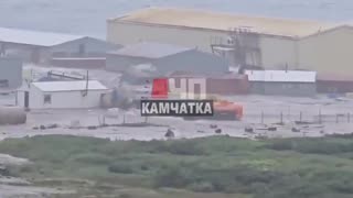 Tsunami waves begin to flood town in Russia's Severo-Kurilsk