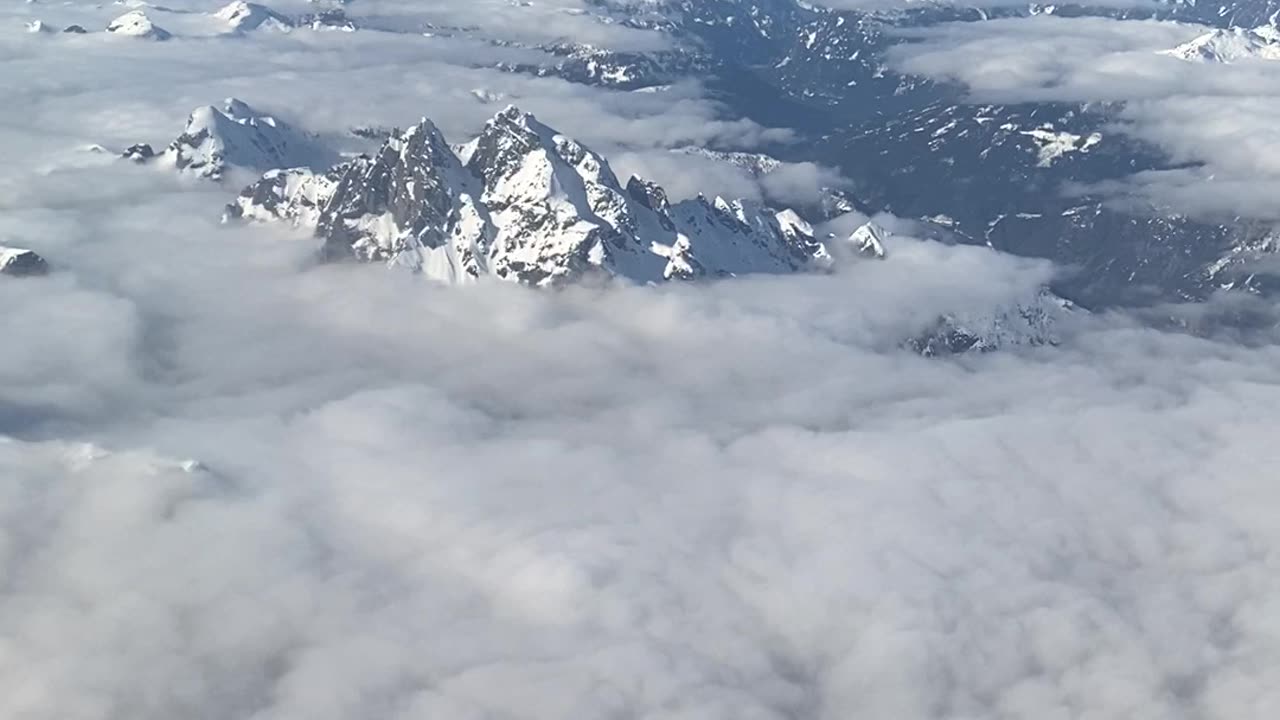 Flight attendant asks to put on seatbelt.