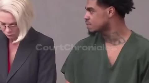 Man starring at judge for losing his case and receiving a lifetime sentence