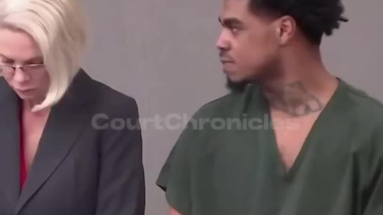 Man starring at judge for losing his case and receiving a lifetime sentence