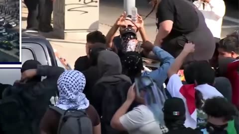 Caught on Tape: LA Riots Organizers Pass Out Gas Masks