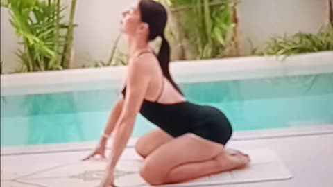 Soothing yoga flow by the pool