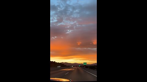 Golden Hour Drive Through a Dreamy Highway Sky